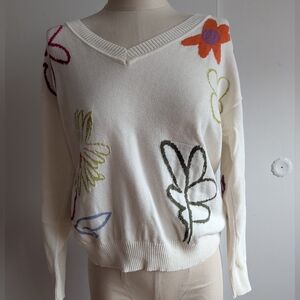Tribal Cream V-Neck Sweater with Multicolor Floral Stitching